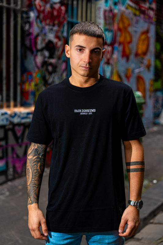 Fair Dinkums Supima Cotton Tee — Black (White Embroidery & Hem Print)